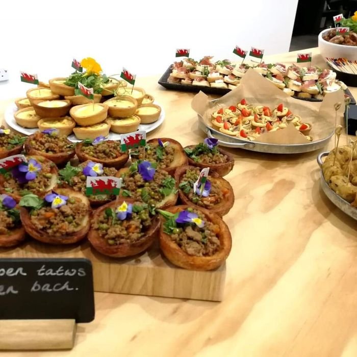 A buffet table with tartlets and canapés