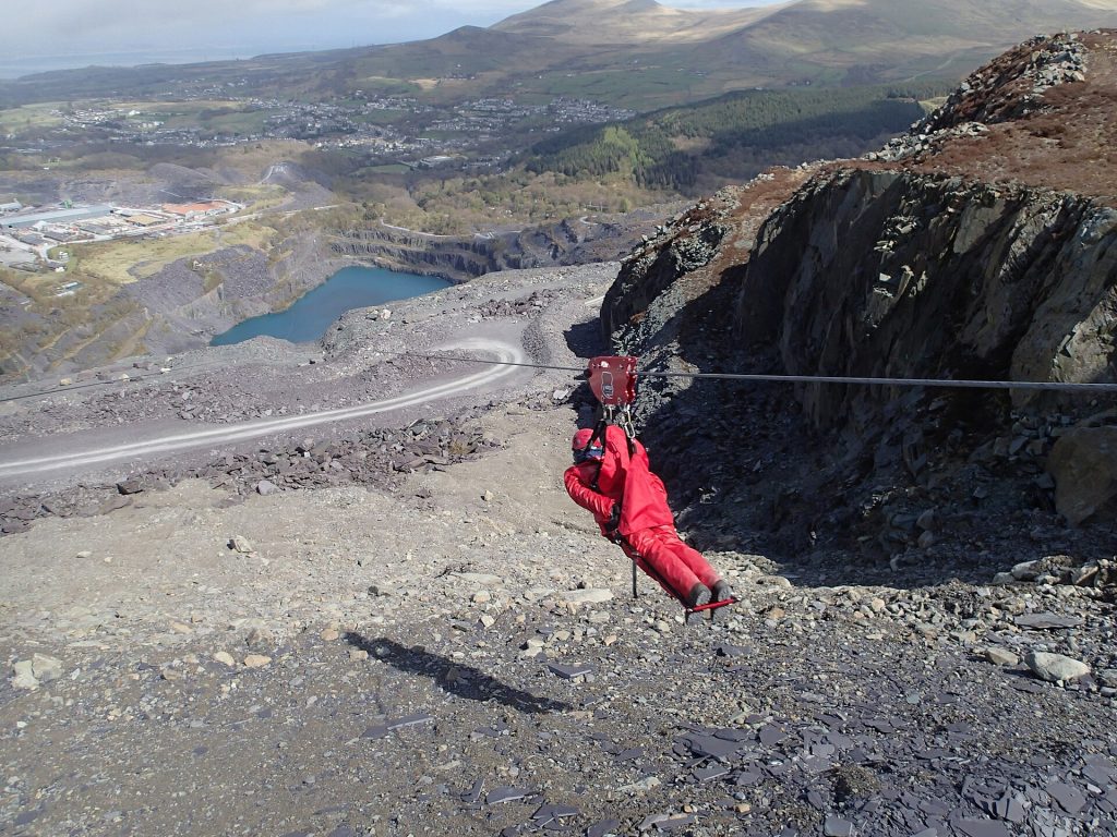 Zip lining at Zip World Penrhyn Quarry